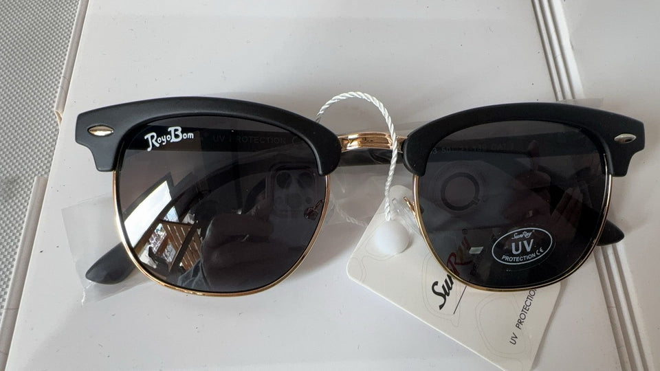 Anteojos Ray-Ban de alta calidad con protección UV y diseño moderno para una visión clara y estilo.