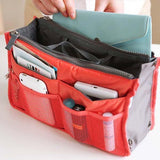 Organizador de Bolsos com Diversos Bolsos mostrando su interior con varios compartimentos y accesorios.